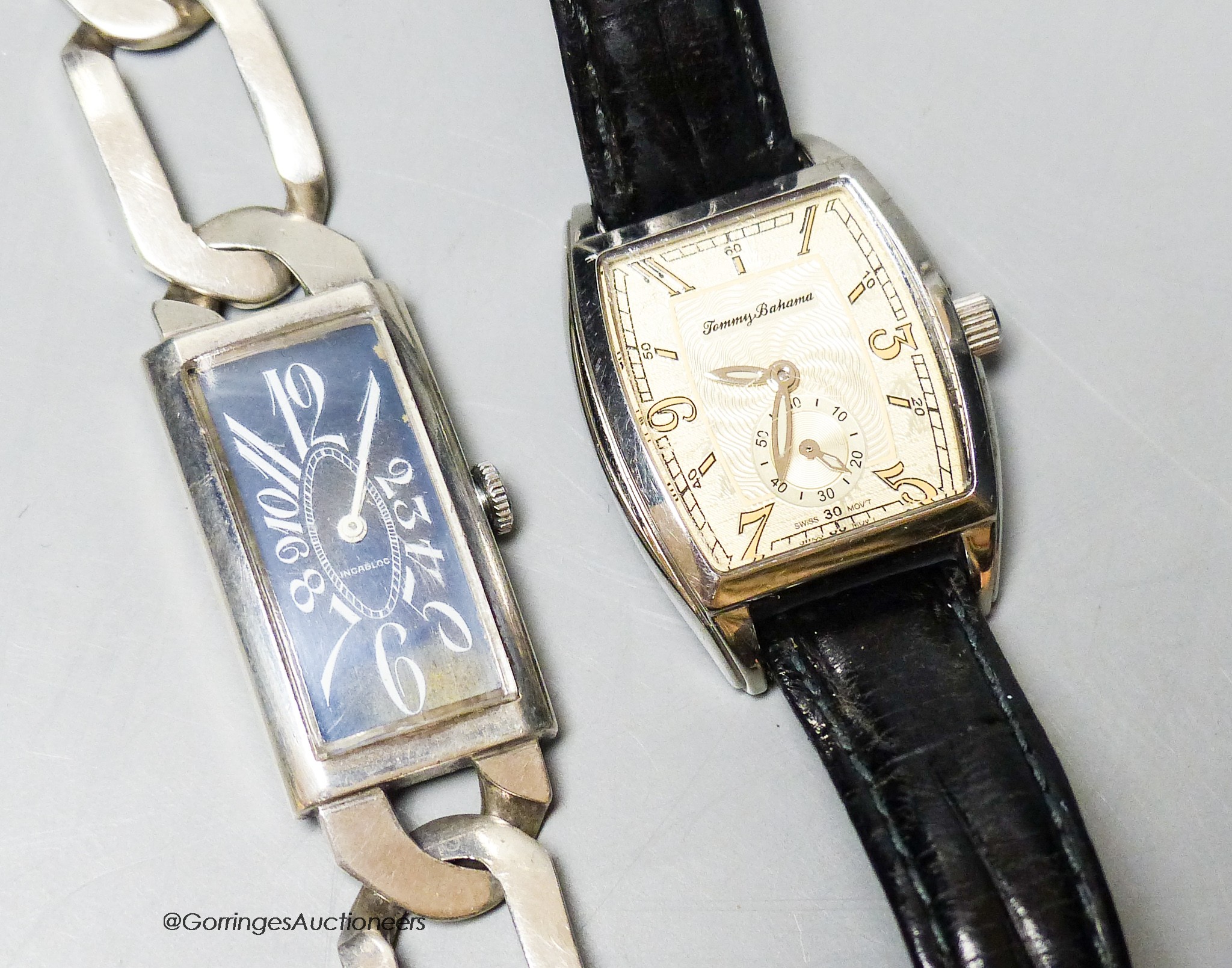 An 800 standard white metal rectangular manual wind wrist watch on a large curb link bracelet, overall 22.3cm and a Tommy Bahama watch.